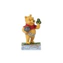 Jim Shore Disney 6016335 Pooh with Clovers and Pot Figurine